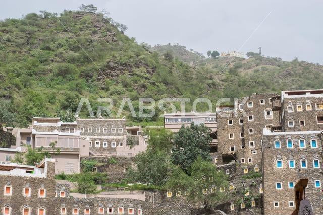 A wonderful photo of the buildings of the city of Rijal Al-Ma',which is characterized by a historical character, in the same way as historical houses