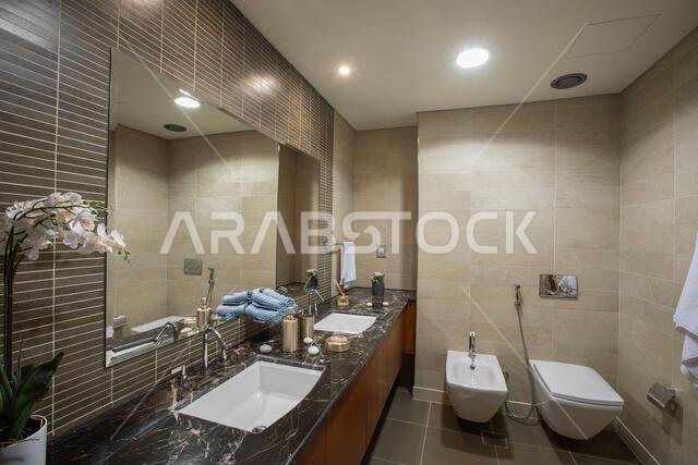 Interior view of a furnished apartment in Riyadh, Saudi Arabia, showing modern furniture, decor, and comfortable living space.