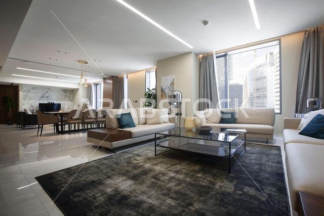 Interior view of a furnished apartment in Riyadh, Saudi Arabia, showing modern furniture, decor, and comfortable living space.