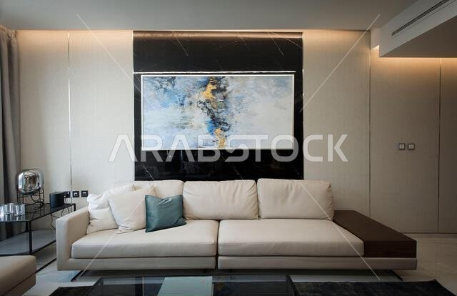 Interior view of a furnished apartment in Riyadh, Saudi Arabia, showing modern furniture, decor, and comfortable living space.