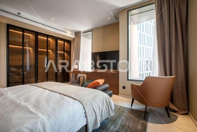 Interior view of a furnished apartment in Riyadh, Saudi Arabia, showing modern furniture, decor, and comfortable living space.