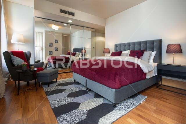 Interior view of a furnished apartment in Riyadh, Saudi Arabia, showing modern furniture, decor, and comfortable living space.