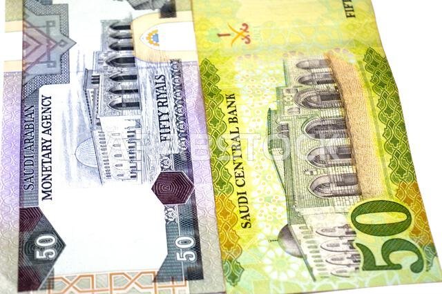 the reverse sides of old and new 50 SAR fifty Saudi Arabian riyals cash money banknotes bill, features Al-Aqsha Mosque in Jerusalem, Saudi Arabia mone the reverse sides of old and new 50 SAR fifty Saudi Arabian riyals cash money banknotes bill, features Al-Aqsha Mosque in Jerusalem, Saudi Arabia mone