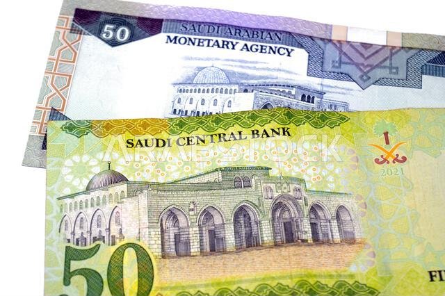the reverse sides of old and new 50 SAR fifty Saudi Arabian riyals cash money banknotes bill, features Al-Aqsha Mosque in Jerusalem, Saudi Arabia mone the reverse sides of old and new 50 SAR fifty Saudi Arabian riyals cash money banknotes bill, features Al-Aqsha Mosque in Jerusalem, Saudi Arabia mone