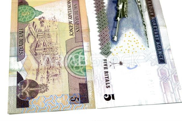 the reverse sides of 5 SAR five Saudi Arabian riyals cash money banknote bill, features Oil refinery, old vintage retro Saudi money from the era of ki