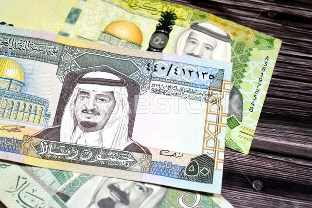 Front sides of 50 SAR fifty Saudi Arabian riyals cash money banknotes bills, features king Fahd, King Salman and king Abdullah Bin AbdulAziz Al Saud a Front sides of 50 SAR fifty Saudi Arabian riyals cash money banknotes bills, features king Fahd, King Salman and king Abdullah Bin AbdulAziz Al Saud a