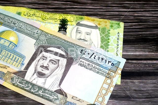 the obverse sides of 50 SAR fifty Saudi Arabian riyals cash money banknotes bills, features king Fahd and king Salman Bin AbdulAziz Al Saud and Dome o