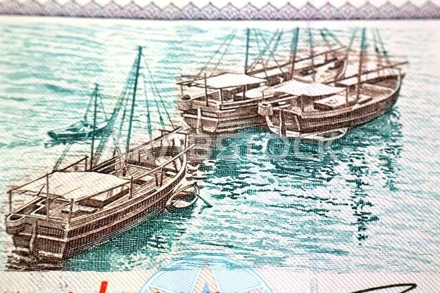 Dhows ships from the obverse side of 5 SAR five Saudi Arabian riyals cash money banknote bill, also features a portrait of king Fahd Bin AbdulAziz Al