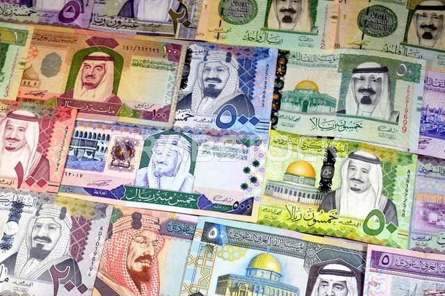 Saudi Arabian riyals SAR banknotes cash money bills, of different times, eras and values, from old vintage retro King Fahd times till king Salman time Saudi Arabian riyals SAR banknotes cash money bills, of different times, eras and values, from old vintage retro King Fahd times till king Salman time