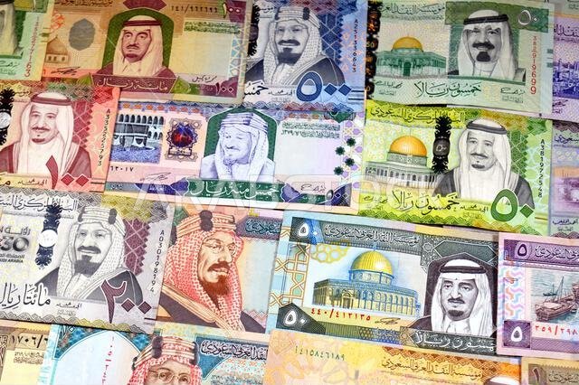 Saudi Arabian riyals SAR banknotes cash money bills, of different times, eras and values, from old vintage retro King Fahd times till king Salman time Saudi Arabian riyals SAR banknotes cash money bills, of different times, eras and values, from old vintage retro King Fahd times till king Salman time