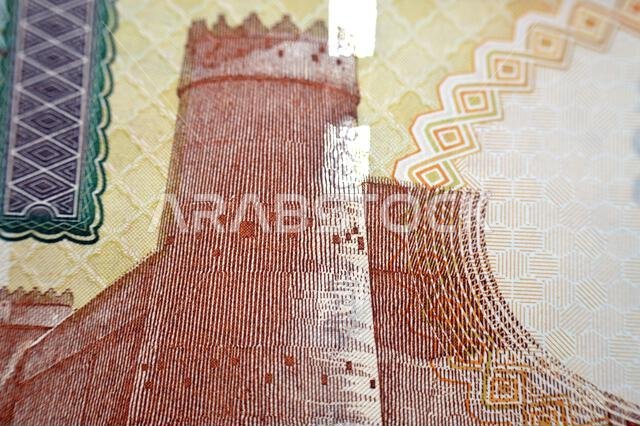تفاصيل الوجه الخلفي لورقة نقدية من فئة 200 ريال سعودي، يظهر قصر المصمك في المنتصف، المملكة العربية السعودية