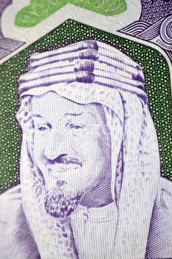 A portrait of King Abdulaziz Bin Abdulrahman Al Saud from obverse side of 500 SAR five hundred Saudi riyals cash money banknote bill, also features Th