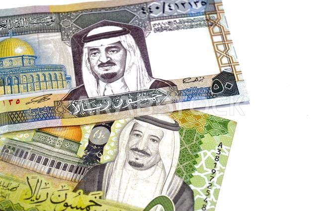 the obverse sides of 50 SAR fifty Saudi Arabian riyals cash money banknotes bills, features king Fahd and king Salman Bin AbdulAziz Al Saud and Dome o the obverse sides of 50 SAR fifty Saudi Arabian riyals cash money banknotes bills, features king Fahd and king Salman Bin AbdulAziz Al Saud and Dome o