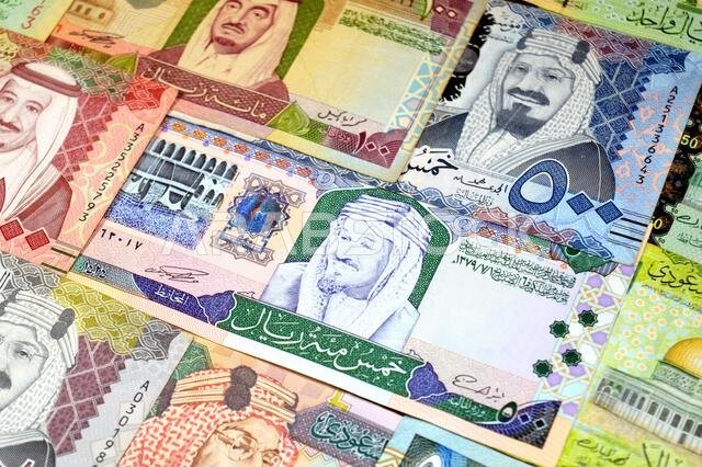 Saudi Arabian riyals SAR banknotes cash money bills, of different times, eras and values, from old vintage retro King Fahd times till king Salman time Saudi Arabian riyals SAR banknotes cash money bills, of different times, eras and values, from old vintage retro King Fahd times till king Salman time