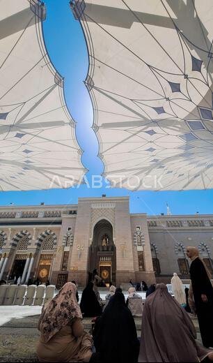 Medina, Saudi Arabia - March 6, 2024: The atmosphere in the courtyard of Al-Masjid an-Nabawi before prayer Medina, Saudi Arabia - March 6, 2024: The atmosphere in the courtyard of Al-Masjid an-Nabawi before prayer