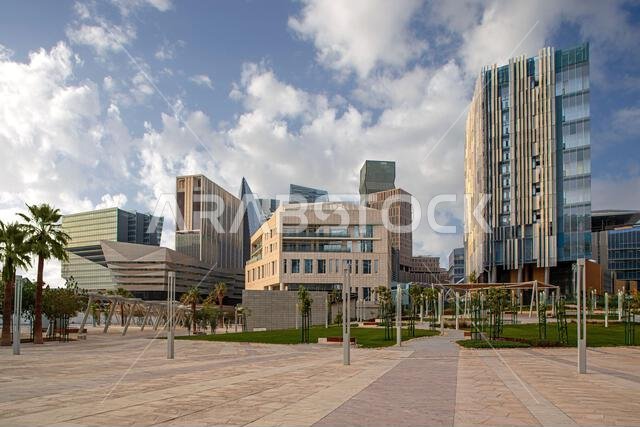 Aerial drone view of King Abdullah Financial District (KAFD) in Riyadh, Saudi Arabia, showing modern skyscrapers and futuristic architecture. Aerial drone view of King Abdullah Financial District (KAFD) in Riyadh, Saudi Arabia, showing modern skyscrapers and futuristic architecture.