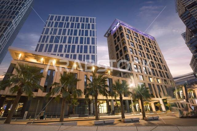 Aerial drone view of King Abdullah Financial District (KAFD) in Riyadh, Saudi Arabia, showing modern skyscrapers and futuristic architecture. Aerial drone view of King Abdullah Financial District (KAFD) in Riyadh, Saudi Arabia, showing modern skyscrapers and futuristic architecture.