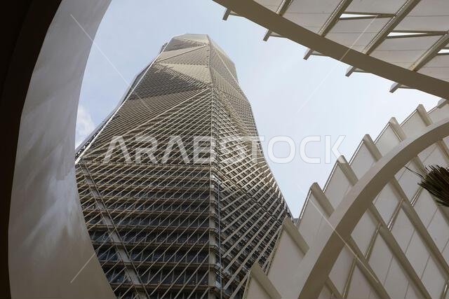 Aerial drone view of King Abdullah Financial District (KAFD) in Riyadh, Saudi Arabia, showing modern skyscrapers and futuristic architecture. Aerial drone view of King Abdullah Financial District (KAFD) in Riyadh, Saudi Arabia, showing modern skyscrapers and futuristic architecture.