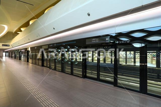 Inside view of KAFD Metro Station in Riyadh, Saudi Arabia, showing modern architecture, clean interior design, and futuristic metro station layout.