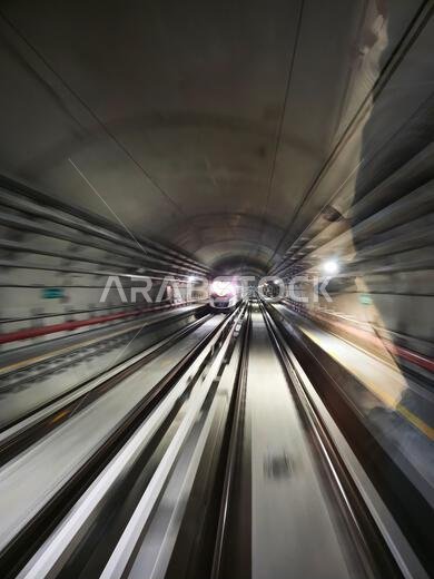 Riding in the modern metro train in Riyad, Saudi Arabia.