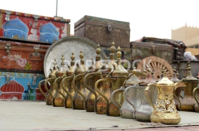 Antique Copper Pitchers and Teapots Displayed at Souq-al-Zal in Riyadh, Saudi Arabia.