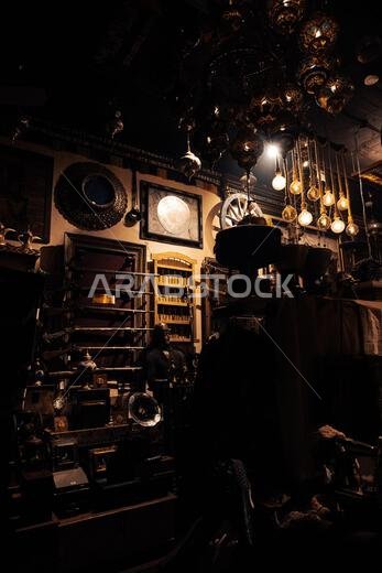 Interior view of a traditional market stall in Al-Hofuf, Saudi Arabia, filled with ornate Arabic souvenirs and handcrafted decorative objects