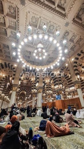 Medina, Saudi Arabia - March 5, 2024: The atmosphere in the Al-Masjid an-Nabawi before prayer Medina, Saudi Arabia - March 5, 2024: The atmosphere in the Al-Masjid an-Nabawi before prayer