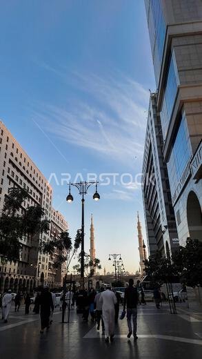 Medina, Saudi Arabia - March 6, 2024: The atmosphere around hotel buildings at dusk near Al-Masjid an-Nabawi Medina, Saudi Arabia - March 6, 2024: The atmosphere around hotel buildings at dusk near Al-Masjid an-Nabawi