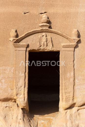 Close-up of a rock-cut tomb at Jabal al-Banat (Mountain of the Women) at the Nabataean archaeological site of Hegra near Ul Ula, Saudi Arabia
