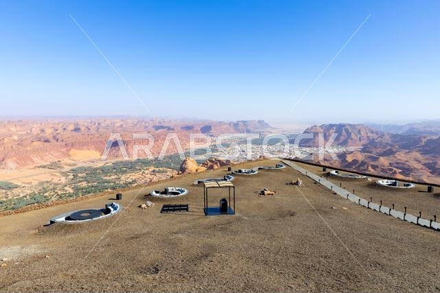 Panoramic views from the outdoor seating area at the Harrat Viewpoint near AlUla, Saudi Arabia