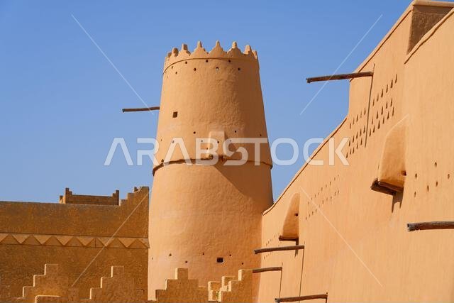 Detailed view of a traditional mud-brick watchtower at Al Masmak Fortress in the heart of Riyadh, Saudi Arabia