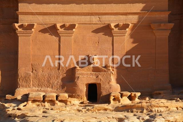 Facade of the majestic Tomb of Lihyan son of Kuza in Hegra, an ancient nabataean city in the desert of Saudi Arabia