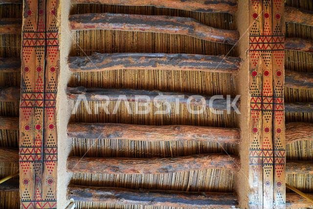 Traditional Najdi painted ceiling with wooden beams at Murabba Historical Palace in Riyadh, Saudi Arabia