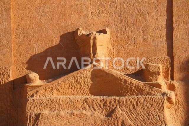 Eagle sculpture on the Tomb of Lihyan son of Kuza in Hegra, an ancient nabataean city in the desert of Saudi Arabia