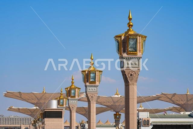 Ornate columns hiding giant umbrellas on Haram Piazza in front of the Prophet's Mosque (Al-Masjid an-Nabawi) in Medina, Saudi Arabia