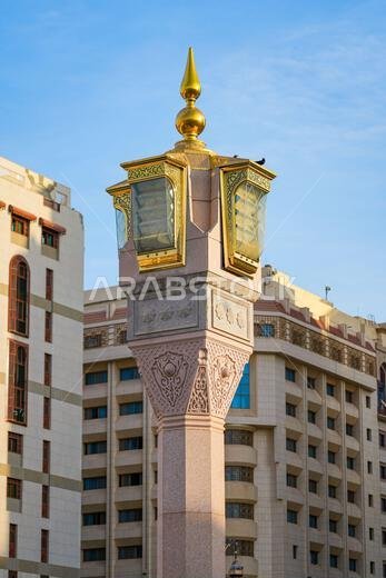 Ornate column hiding a giant umbrella on Haram Piazza in front of the Prophet's Mosque (Al-Masjid an-Nabawi) in Medina, Saudi Arabia