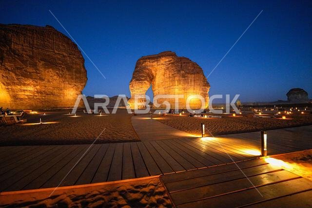 Wooden boardwalk leading to the iconic Elephant Rock in AlUla at dusk, Saudi Arabia Wooden boardwalk leading to the iconic Elephant Rock in AlUla at dusk, Saudi Arabia