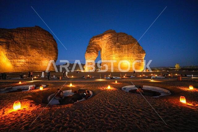 Luxury desert lounge at the foot of Elephant Rock (Jabal Al-Fil) at dusk in the desert of AlUla, Saudi Arabia Luxury desert lounge at the foot of Elephant Rock (Jabal Al-Fil) at dusk in the desert of AlUla, Saudi Arabia