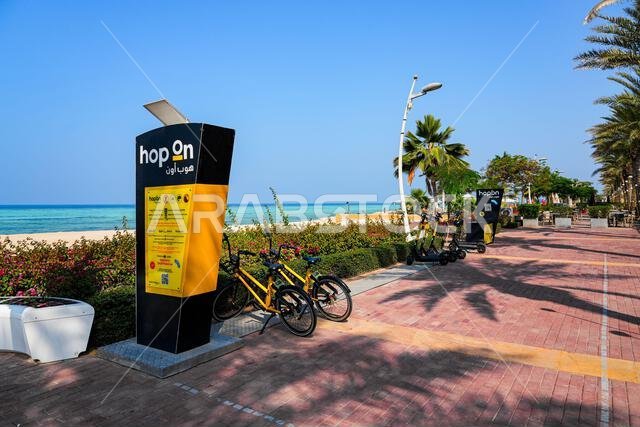 Hop On bike and scooter sharing station on the KAEC waterfront promenade in Saudi Arabia