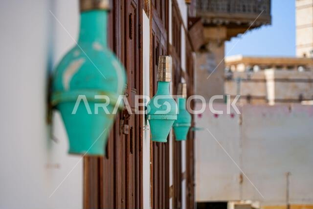 Traditional turquoise wall decorations in the historic Al-Balad district of Yanbu, Saudi Arabia