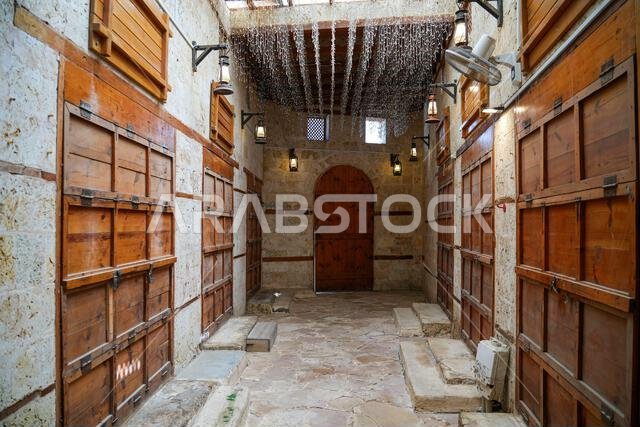 Traditional alleyway and wooden shopfronts in Yanbu's historic Night Market in Saudi Arabia