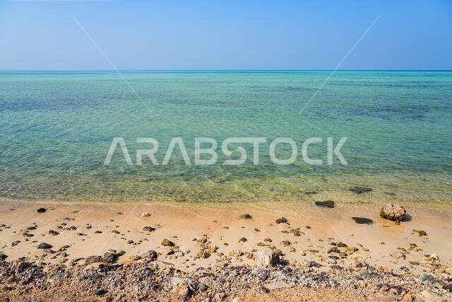 Pristine turquoise waters and rocky shoreline along the Red Sea in King Abdullah Economic City (KAEC), Saudi Arabia Pristine turquoise waters and rocky shoreline along the Red Sea in King Abdullah Economic City (KAEC), Saudi Arabia