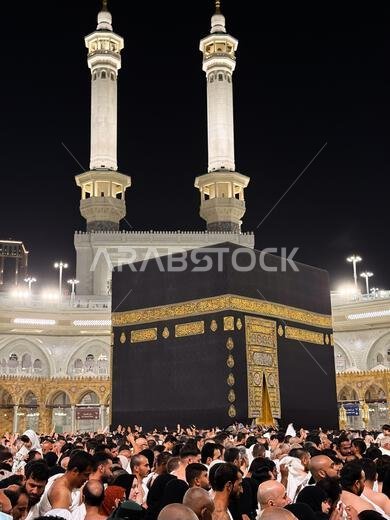 Pilgrims circumambulating the Kaaba at night in Masjid al-Haram, Mecca during Hajj