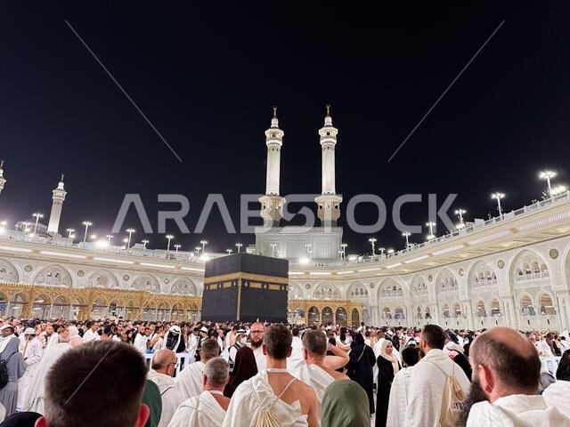 Pilgrims gathered around the Kaaba at Masjid al-Haram in Mecca during evening tawaf