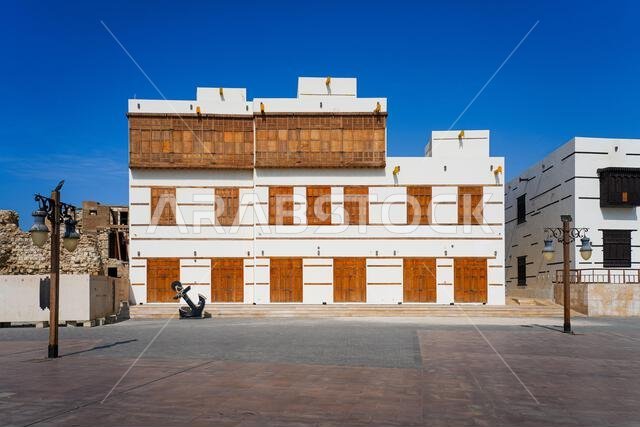 Traditional architecture with wooden mashrabiyas in Al-Balad, Yanbu's historic district on the Red Sea coast of Saudi Arabia Traditional architecture with wooden mashrabiyas in Al-Balad, Yanbu's historic district on the Red Sea coast of Saudi Arabia