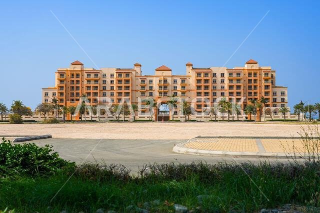 Modern residential apartment complex with Mediterranean architecture in King Abdullah Economic City (KAEC), Saudi Arabia