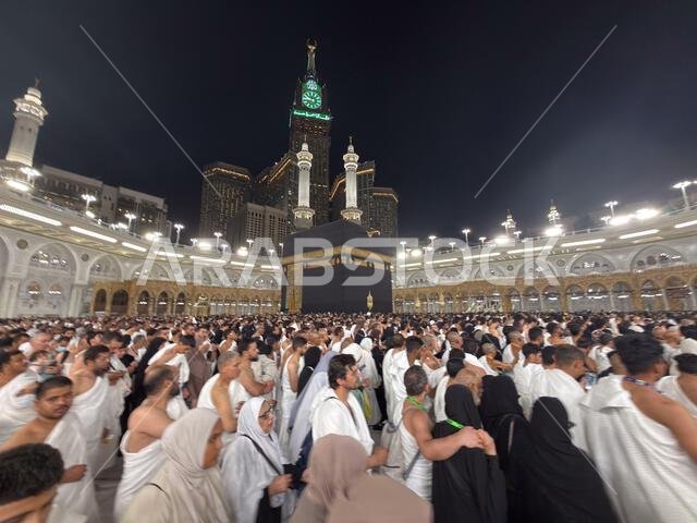 Pilgrims circling the Kaaba at Masjid al-Haram in Mecca during night pilgrimage