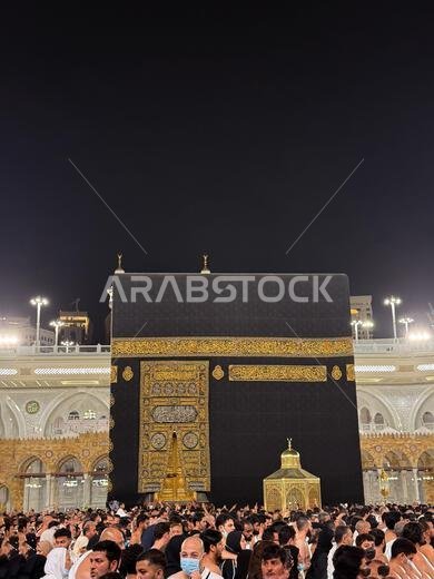 Pilgrims performing tawaf around the Kaaba at Masjid al-Haram in Mecca during night prayer