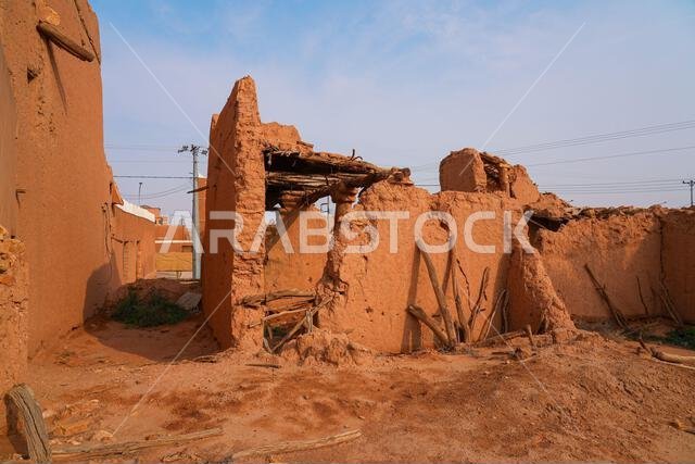 Crumbling mud brick ruins of an ancient building in the historic village of Shaqra, Saudi Arabia