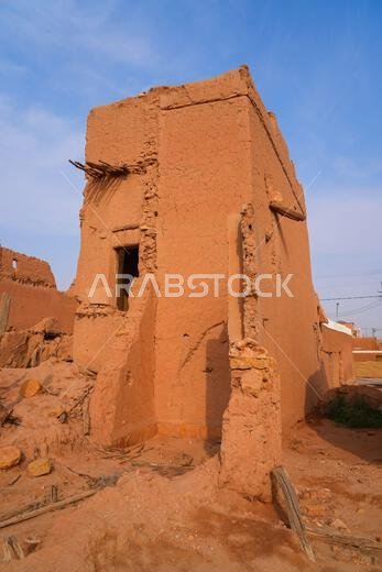 Crumbling mud brick ruins of an ancient building in the historic village of Shaqra, Saudi Arabia